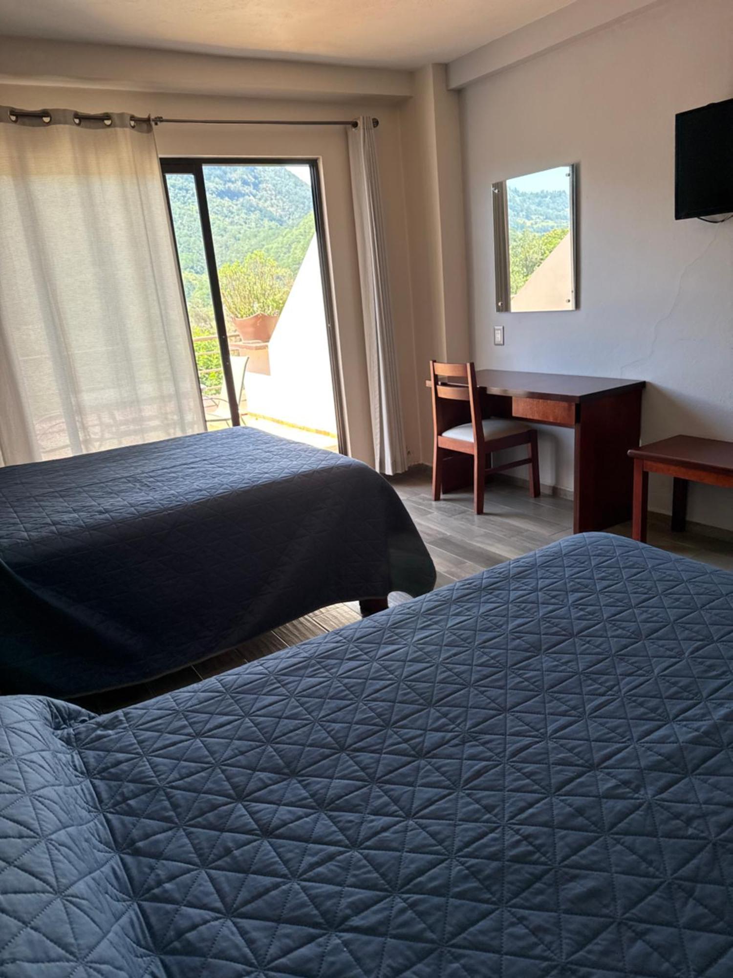 Hotel Suites Don Miguel Tlatlauquitepec Extérieur photo
